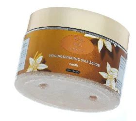 Vanilla salt scrub in elegant round container.